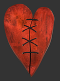 Repaired sculpted wooden heart – handcrafted wall decoration – symbolic laced heart